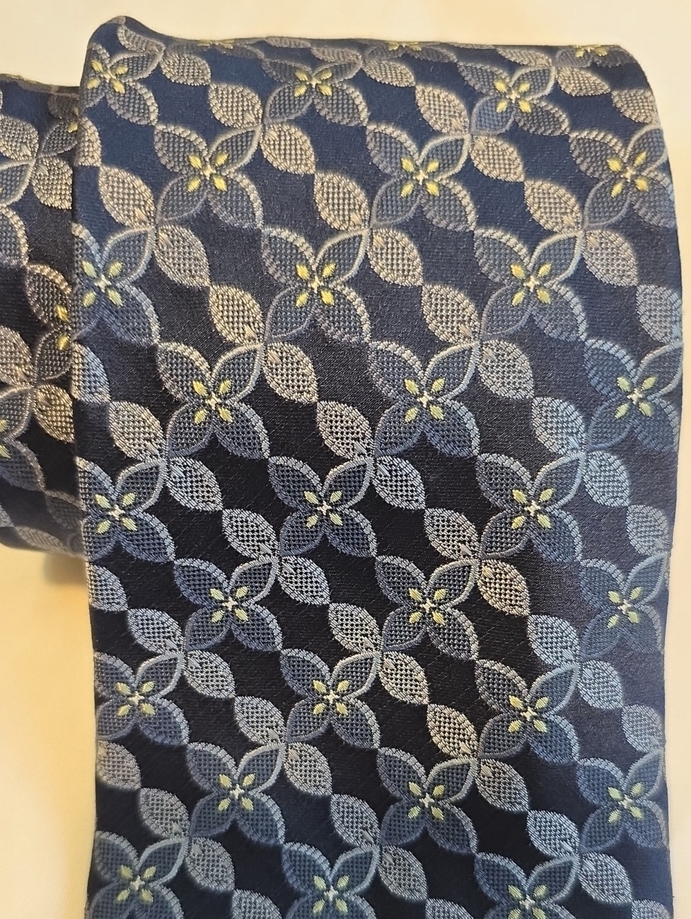 Joseph Abboud Navy Blue Geometric Floral Tie with Light Blue and Yellow Accents